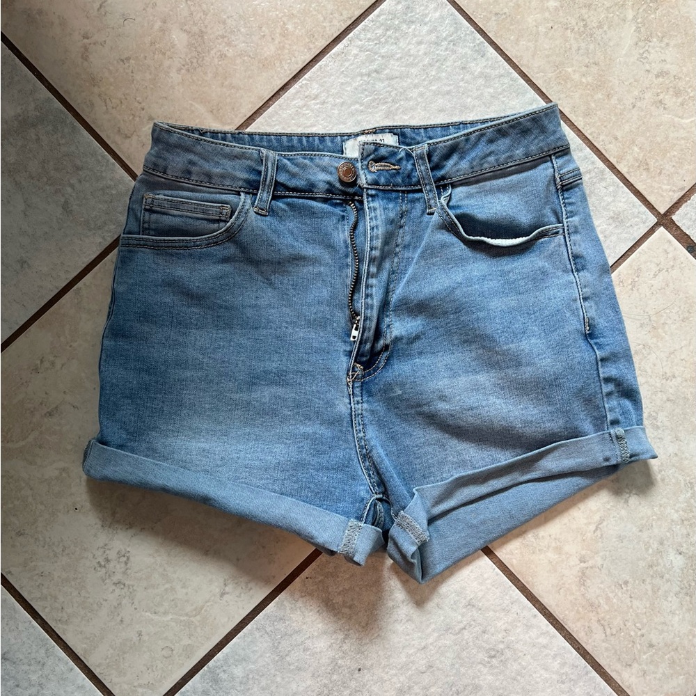 Forever 21 high-waisted blue denim shorts with rolled up cuffs